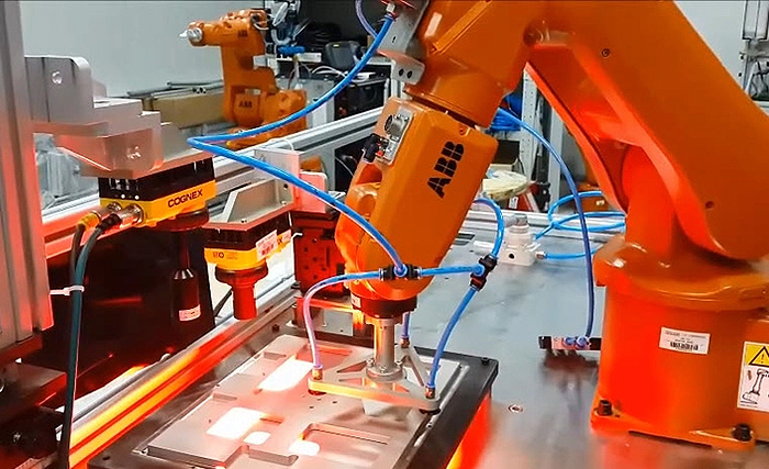 Robotic Arm in a medical device manufacturing setting