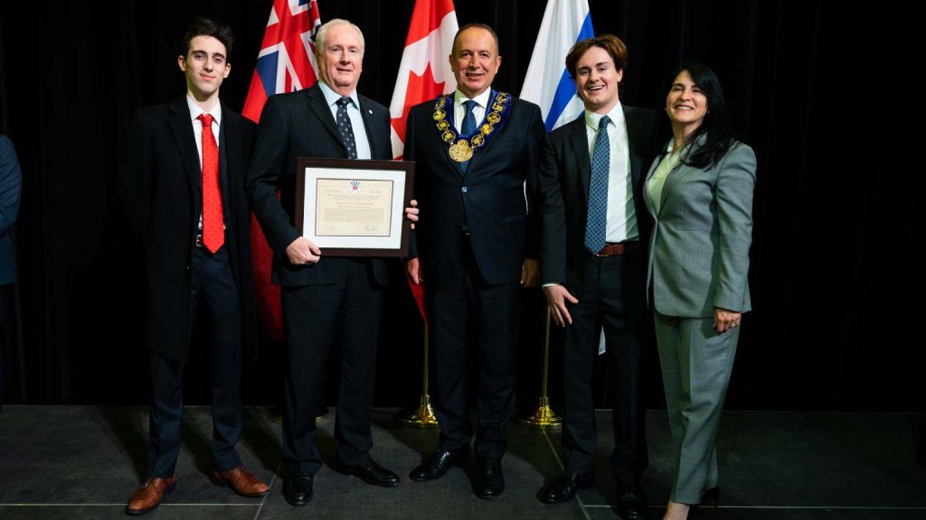 CEO of Sterling Industries, David Van Slingerland and his sons at the Order of Vaughan Ceremony