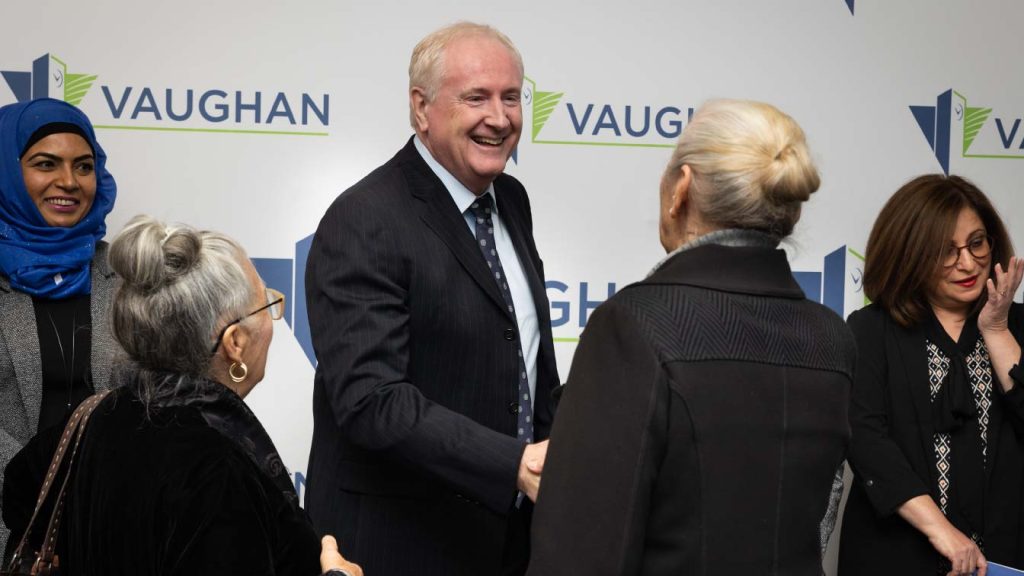 People's greeting CEO of Sterling Industries, David Van Slingerland, at the Order of Vaughan Ceremony