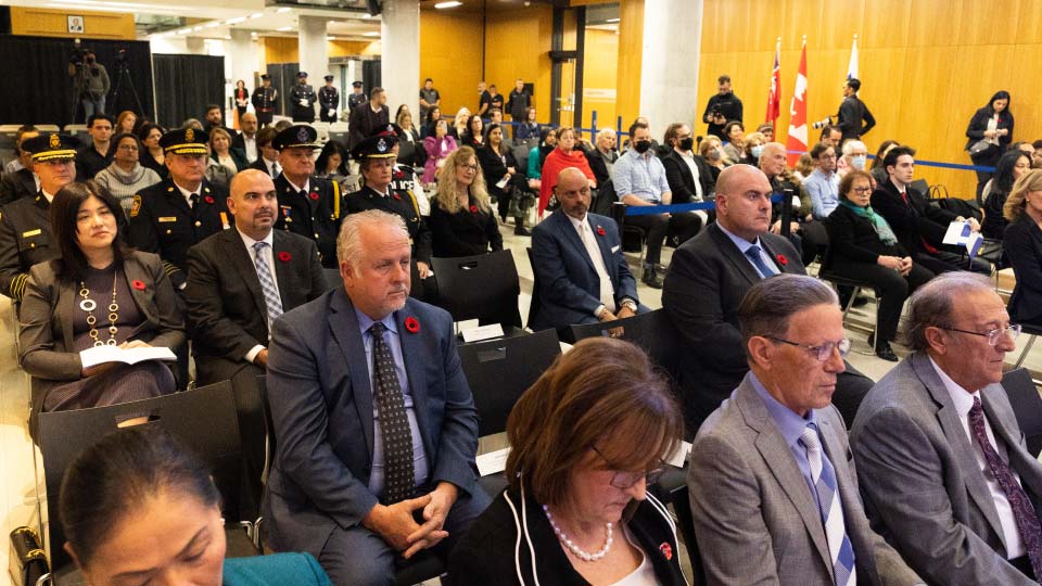 The Order of Vaughan's Audience’s watching CEO of Sterling Industries, David Van Slingerland, receiving his award from Mayor Maurizio Bevilacqua in the investiture ceremony at Vaughan City Hall.