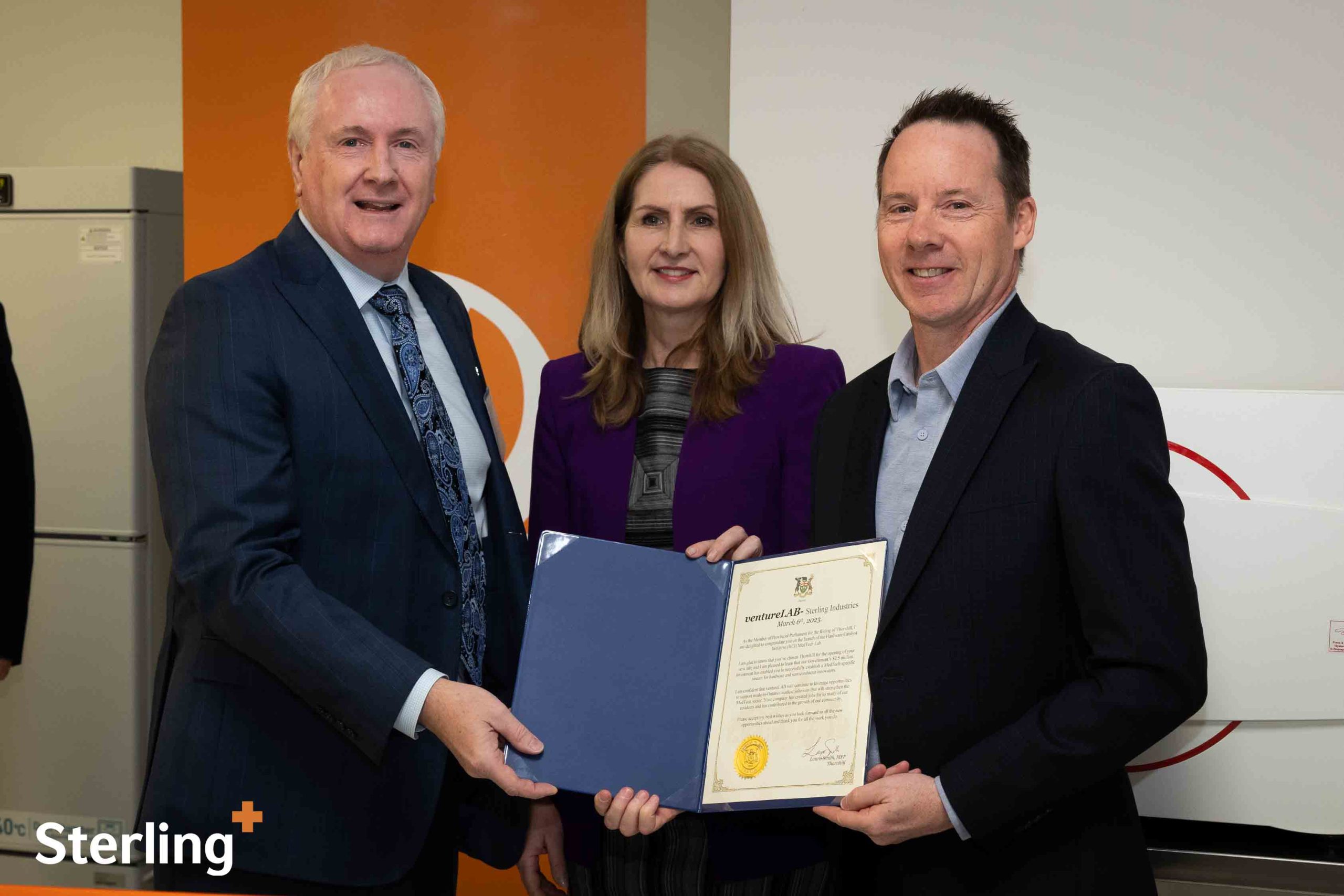 Matt Skynner, David Van Slingerland, and Laura Smith, MPP, at cutting the ribbon ceremony for the MedTech Innovation Lab at Sterling Industries.