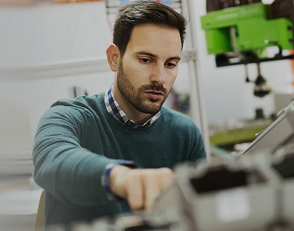 An engineer working on a medical device