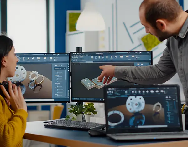 Engineers working on a design